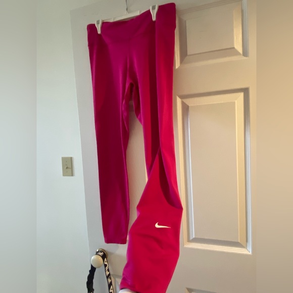 Pink Nike tights. - Picture 1 of 5
